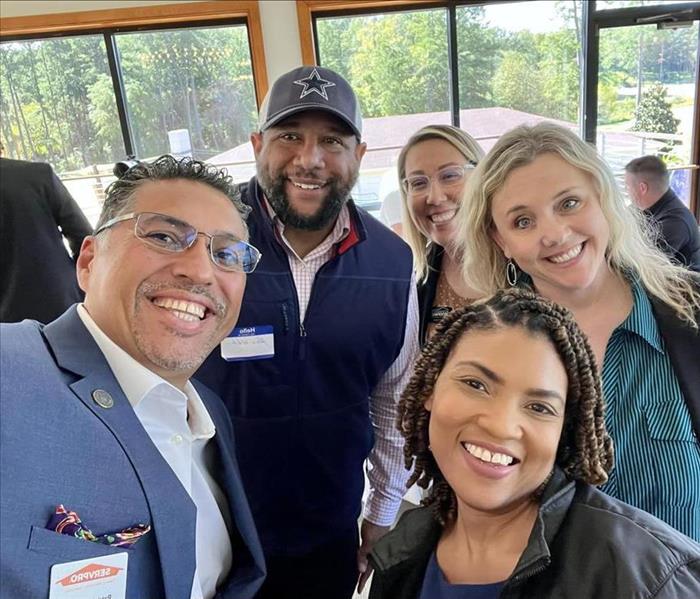 smiling group of people in a selfie