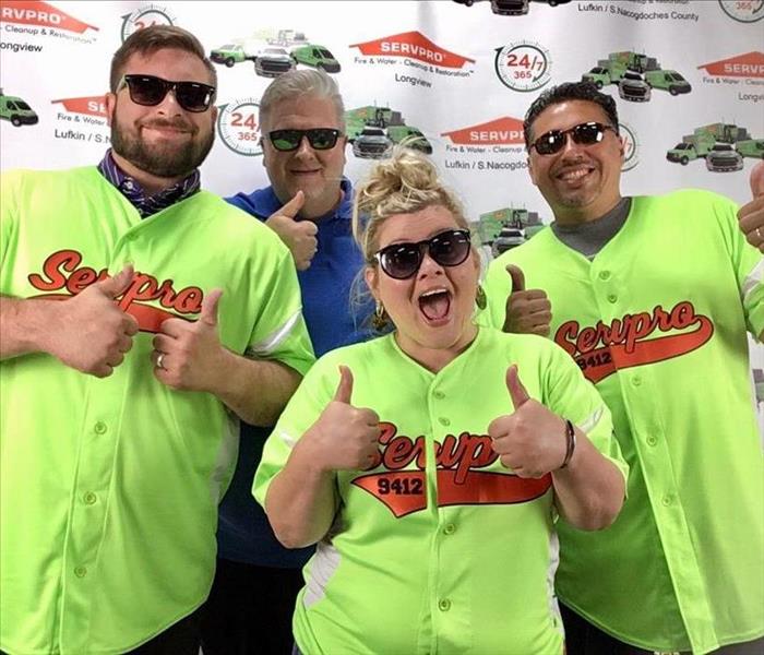 A group of SERVPRO employees posing for a picture