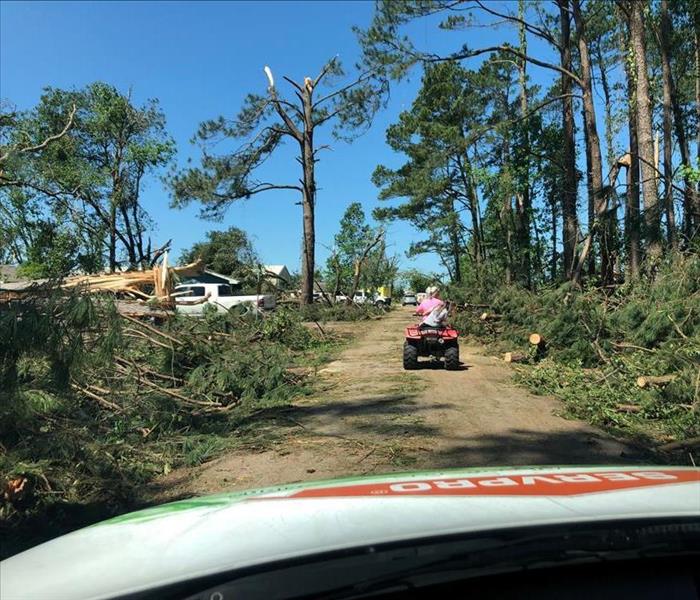 Car driving in weather damaged area