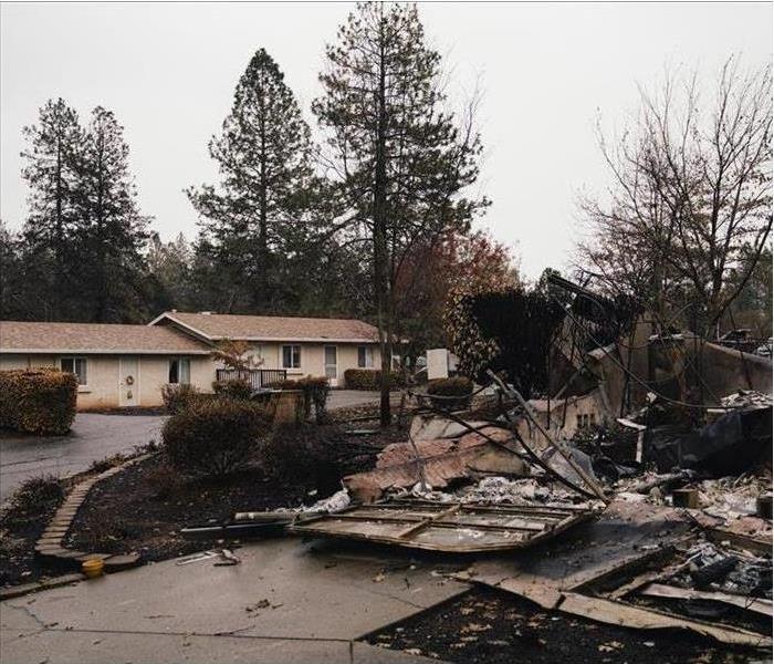 A home that has been burned and charred after a fire.