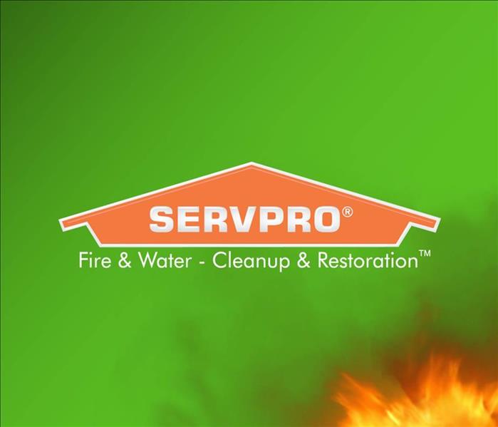 SERVPRO logo in front of fire